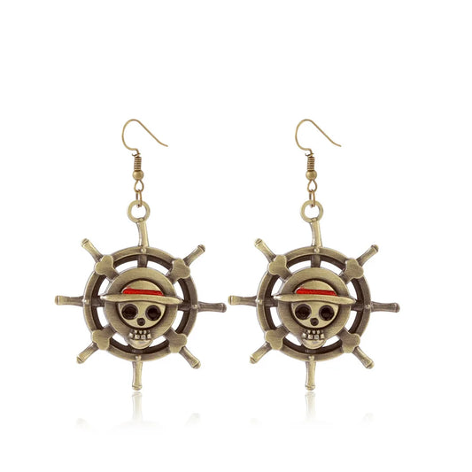 One Piece Ohrringe – Schiffsruder & Piratenschädel