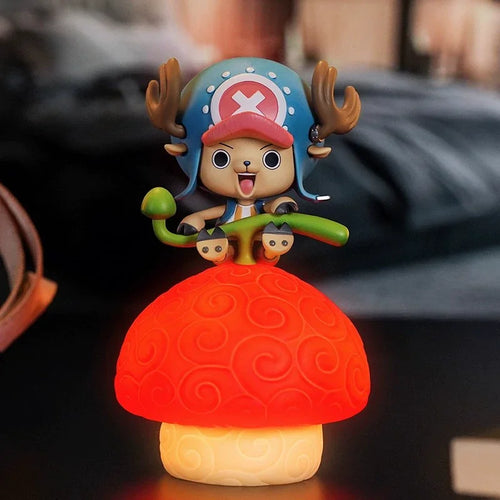 Figurine One Piece - Tony Tony Chopper assis sur Fruit du Démon (Gomu Gomu)